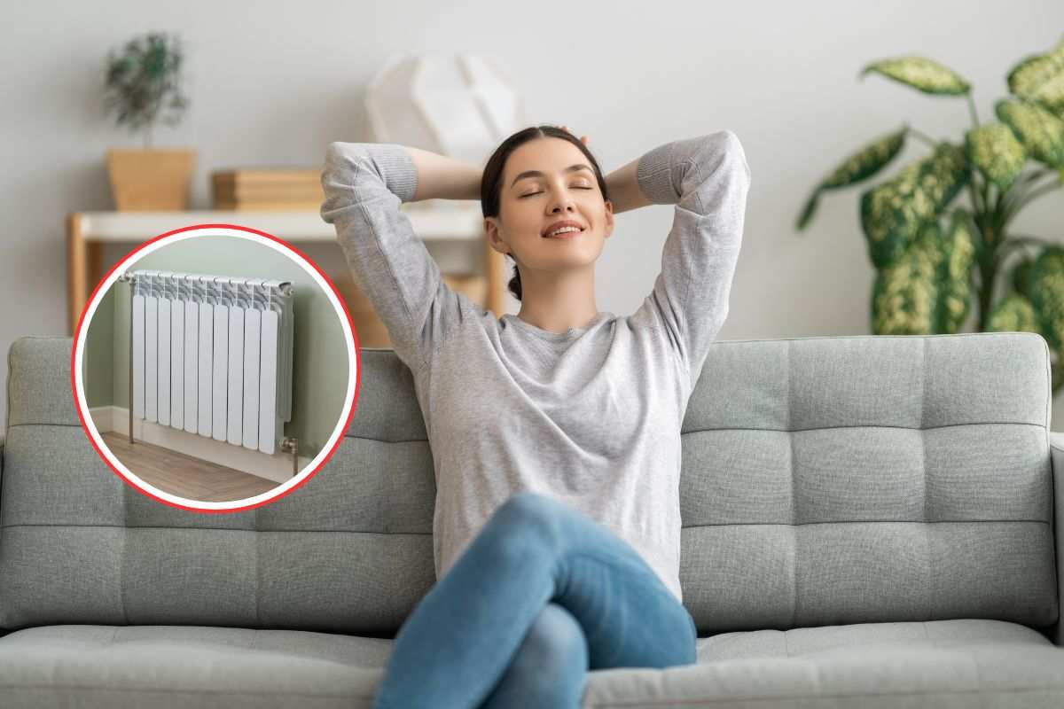 donna sul divano e termosifone